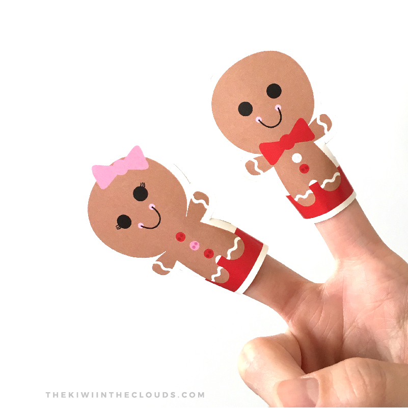 FREE Printable Gingerbread Boy + Girl Finger Puppets | Do you need an easy way to entertain your little one's while making your world famous Christmas dinner? Then click through to download your free printable today.