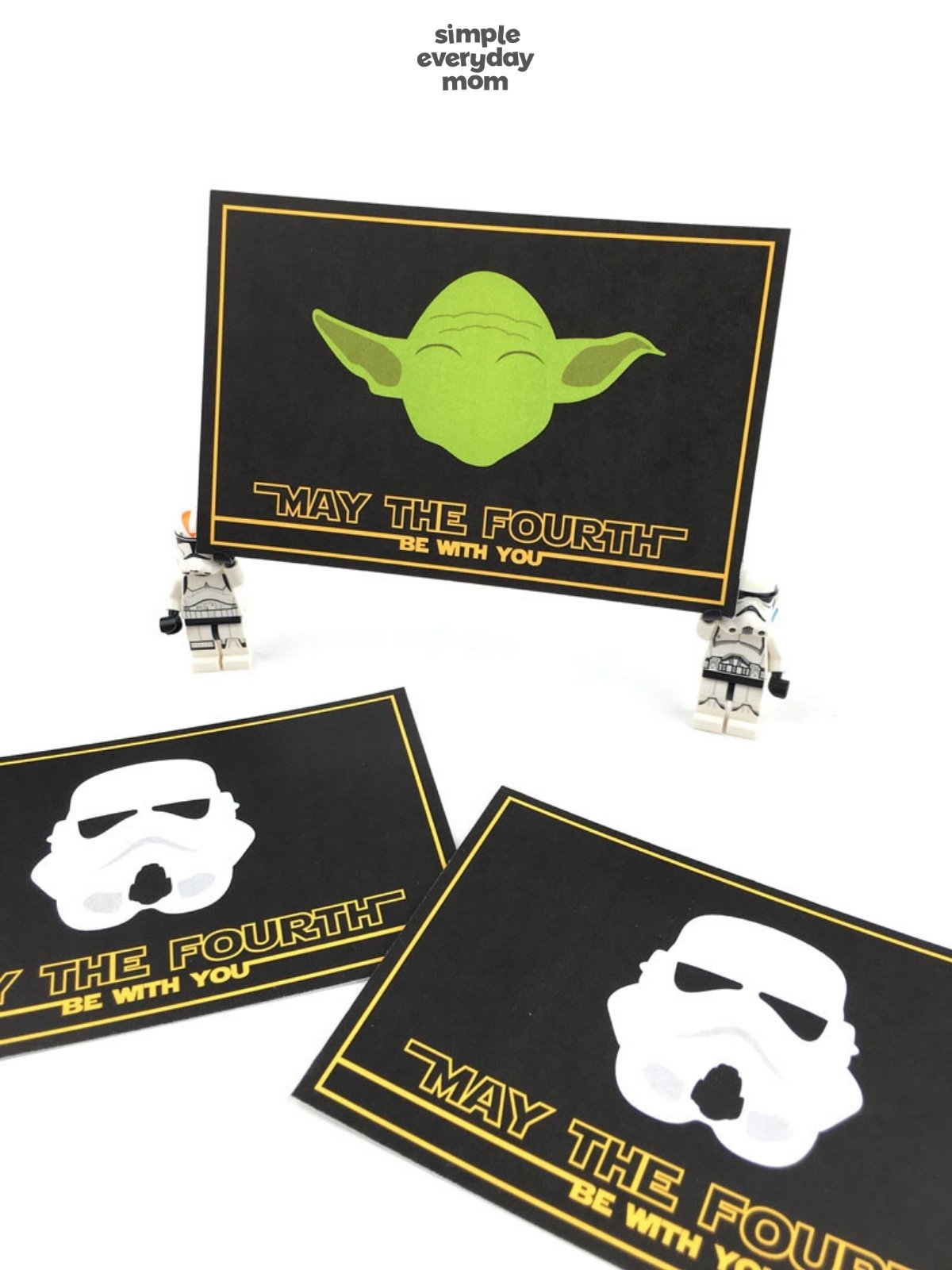 Star Wars-themed cards with black backgrounds, yellow borders, and “May the Fourth be with you” text, featuring Grogu and stormtrooper helmet designs.