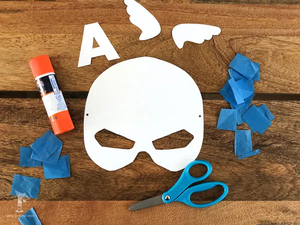 captain america mask template with scissors, glue stick and tissue paper