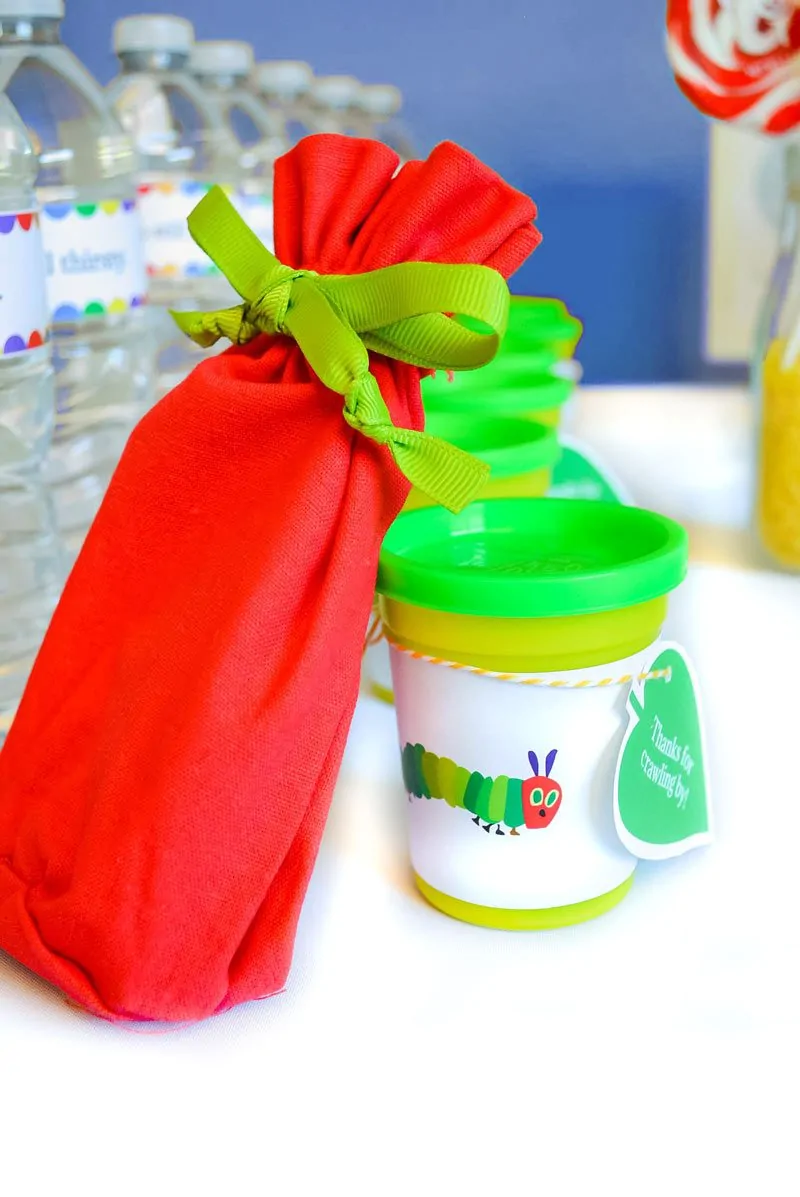 Find out how to create easy and inexpensive party favors for a Very Hungry Caterpillar themed birthday party.