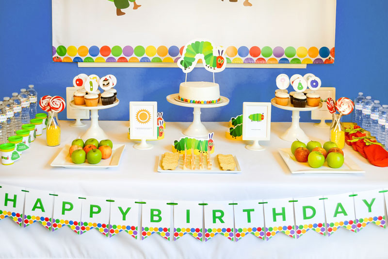 Be inspired by this modern and colorful Very Hungry Caterpillar party and download a FREE fill in the blank invitation for your own little one's party!