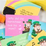 printable St. Patrick's day notes for kids with carrots, banana an dapple in the background with the words St. Patrick's Day lunch box notes