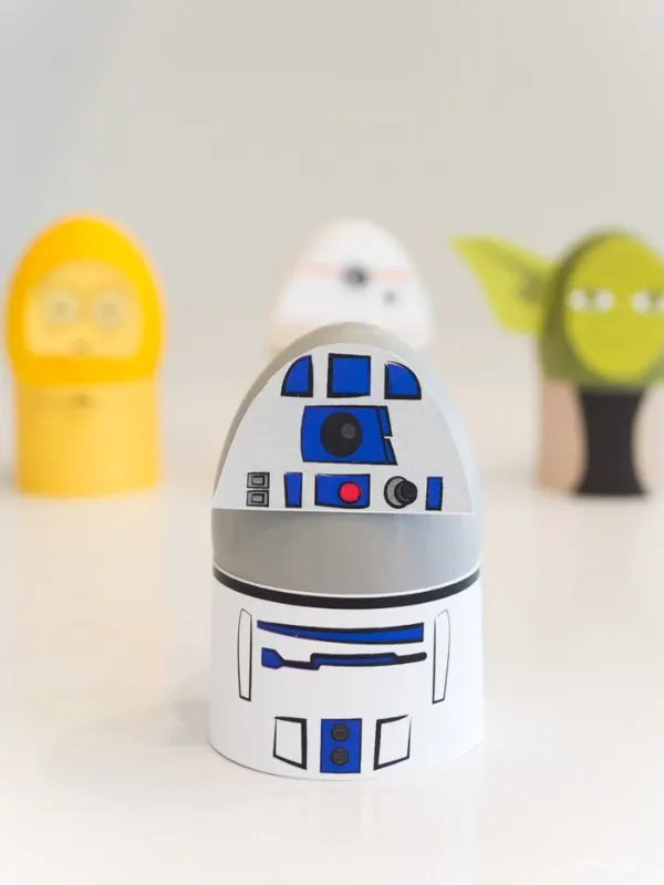 R2D2 Easter egg with C3-P0, BB-8, & Yoda Easter eggs in the background
