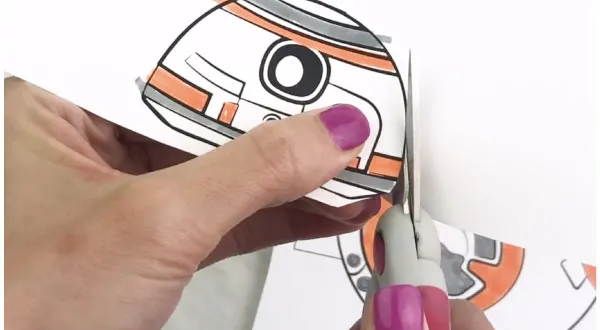 hand cutting out bb-8 card craft