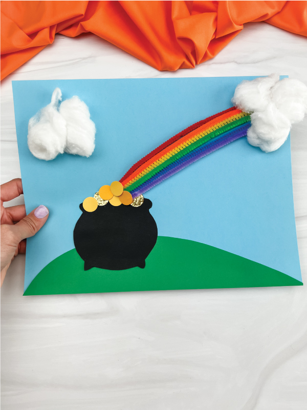 hand holding pot of gold craft