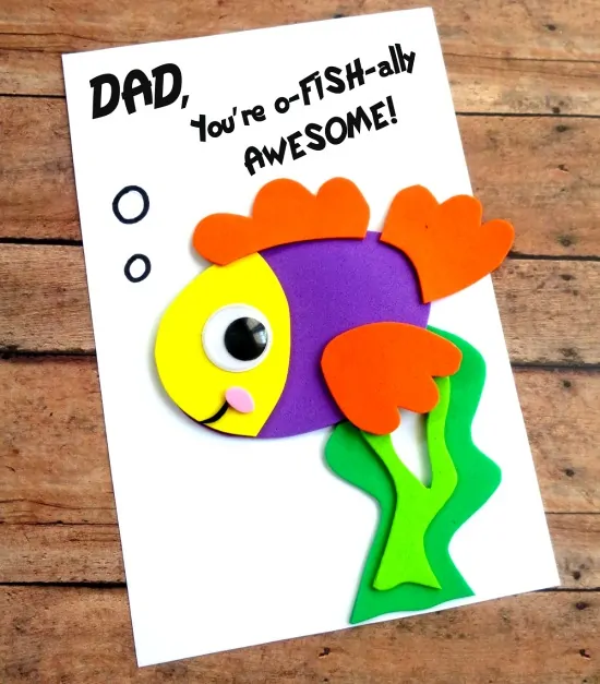DIY fish Father's Day card on wood backdrop