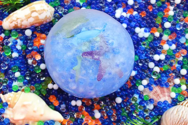 Ocean Kids Activity | Incorporate fun and learning in one this summer with this frozen ocean sensory bin for children. You can use your child's favorite ocean animals like sea turtles, dolphins, sharks and more! #educationalactivities #summerscience #summeractivities #kidssummeractivities