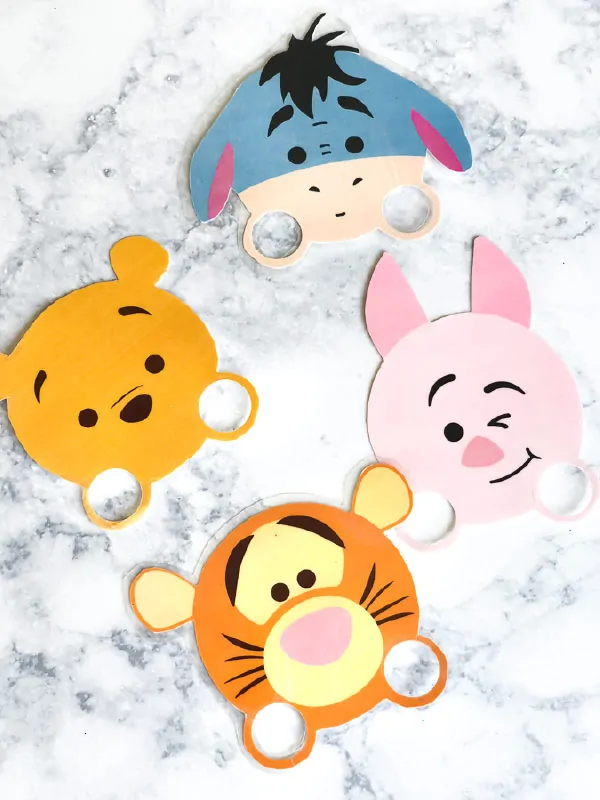 Free Printable Winnie The Pooh Finger Puppets | Kids will love playing with these cute tsum tsum style finger puppets. They're great for imaginative play time. #winniethepooh #christopherrobin #kidsandparenting #kidsactivities #ideasforkids #kidscraft #craftsforkids