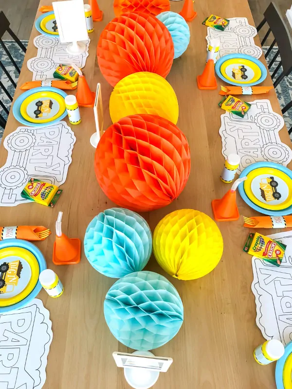 Construction Party Decoration Ideas | Make your under construction theme come to life with these easy decoration ideas including a simple honeycomb centerpiece, 4x6 table signs and fun place settings. #kids #kidsparty #kidsparties #ideasforkids