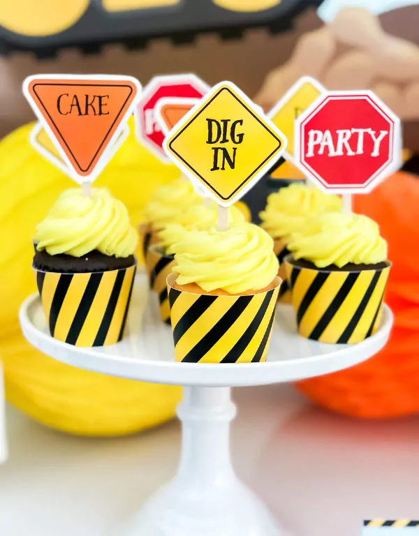 Construction Cupcake Toppers & Wrappers | Boys will love these fun road sign cupcake toppers and wrappers. #kids #boysparty #boybirthday