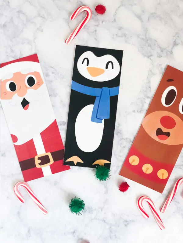 Free Printable Christmas coloring page bookmarks of Santa, Rudolph the Red Nosed Reindeer and a penguin. #kids #kidsactivities #ideasforkids #christmas #freeprintable #elementary #teacher