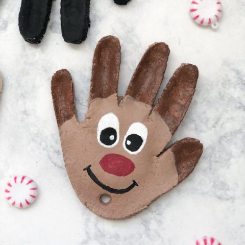 Christmas Salt Dough Ornaments | Make this reindeer handprint ornament this Christmas with just a few supplies. It's a fun Christmas craft for kids they'll love doing! #kids #kidsandparenting #kidscrafts #craftsforkids #kindergarten