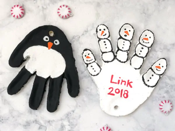 DIY Chrismtas Ornaments For Kids | Learn how to make these easy salt dough handprint ornaments. It's cheap, fun and makes a great keepsake for grandparents! #christmascrafts #christmas #toddlers #baby #saltdough #preschool