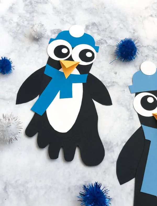 Winter Craft For Kids | Learn how to make these simple penguin footprints. They're perfect for kindergarten or elementary aged kids. #kids #elementary #teachingkindergarten #ideasforkids #kidsandparenting #wintercrafts