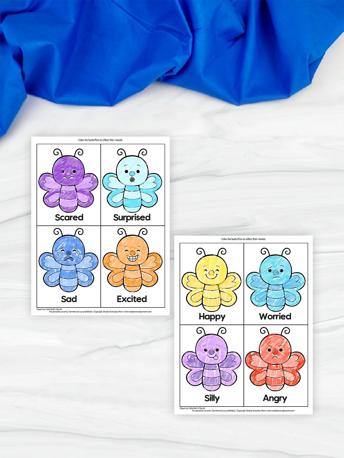 Two worksheets with cartoon butterflies labeled with emotions including scared, surprised, sad, excited, happy, worried, silly, and angry. Each butterfly is colored differently to represent the emotion.