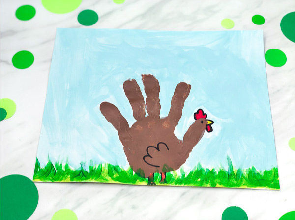 Handprint Craft For Kids | Toddlers, preschool and kindergarten kids will have fun making this chicken art project. It's great for when learning about the farm or for the spring time. #kids #kidsactivities #kidscrafts #craftsforkids #activitiesforkids #ece #earlychildhood #handprintcrafts #springcrafts #farm