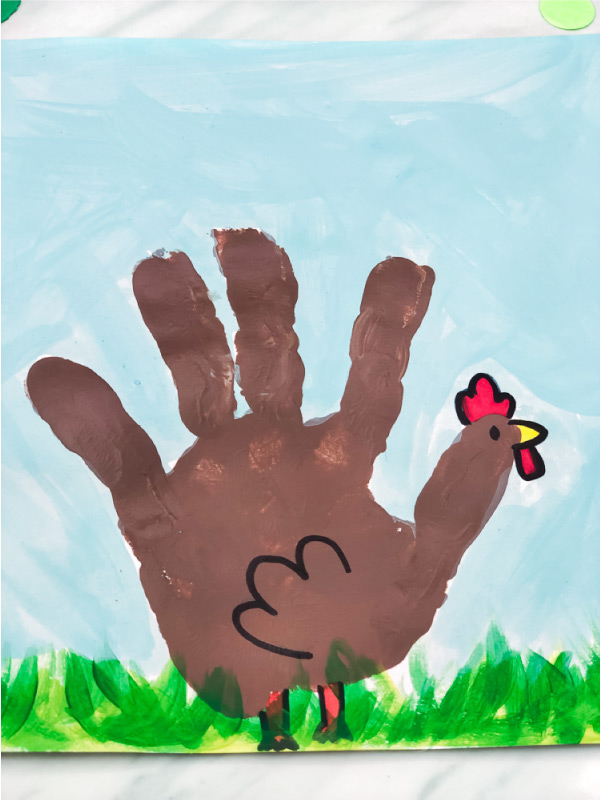 Handprint Craft For Kids | Toddlers, preschool and kindergarten kids will have fun making this chicken art project. It's great for when learning about the farm or for the spring time. #kids #kidsactivities #kidscrafts #craftsforkids #activitiesforkids #ece #earlychildhood #handprintcrafts #springcrafts #farm