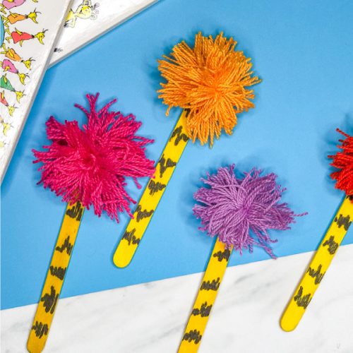 Dr Seuss Craft For Kids | Make this easy popsicle stick truffula tree craft. It's perfect to do at home or in the classroom. #preschool #elementary #kindergarten #teachers #kids #toddlers #kidsactivities #kidscrafts #craftforkids #ideasforkids #drseuss #drseusscrafts #drseussactivities