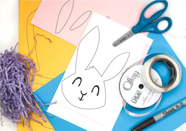 Easter Basket Craft For Kids | Make this easy peek a boo bunny craft with a few simple supplies. Perfect for toddlers, preschoolers and kindergarten children. #easter #easatercrafts #eastercraftsforkids #toddlers #preschoolers #kindergarten #easykidscraft #kidscrafts #craftsforkids #kidsactivities #ece #elementary #classroom #children 