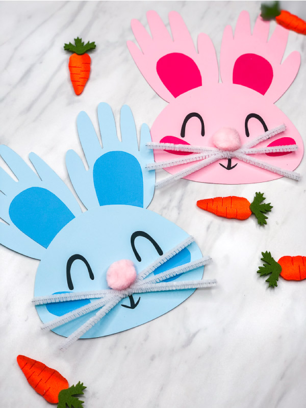 Rabbit Craft For Kids | Make this DIY handprint bunny art project for Easter or springtime. It's easy enough for preschool and kindergarten children, plus it comes with a free printable template. #kids #easter #eastercrafts #easteractivities #preschool #teachingkindergarten #simpleeverydaymom #bunnycraft #handprintcrafts #ideasforkids #artprojects #kidscrafts