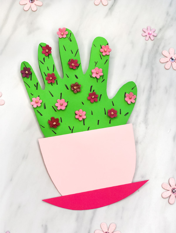 DIY Mother's Day Card Idea | Make this handprint cactus card for Mom this May. #preschool #mothersday #mothersdaycrafts #handprintcrafts #kindergarten #kidsactivity #mothersday #mothersdaycrafts #mothersdayactivities #kidsart #cactuscrafts