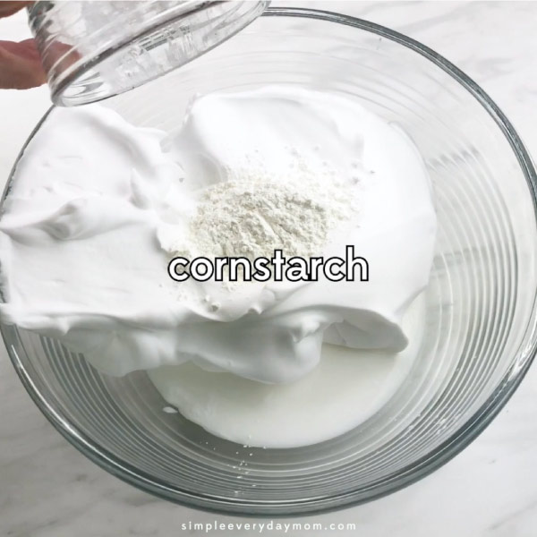 cornstarch being added to clear bowl