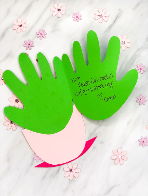DIY Mothers Day Card | Tell mom she's fan-cactus with this easy handprint cactus handmade card. #mothersday #mothersdaycrafts #cactuscrafts #handmadecard #diycard #preschoolcrafts #kindergarten #teachingkindergarten #mothersday #mom #ideasforkids #kidsandparenting
