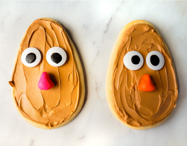 Mr. & Mrs. Potato Head Cookies | Make these DIY sugar cookies for your next Toy Story birthday party or just for fun! They're simple enough to have the kids help too! #themedbirthdays #birthdayparty #parties #partyfood #toystory #toystory4 #disney #partyideas #sugarcookies #cookies #desserts #kidsfood
