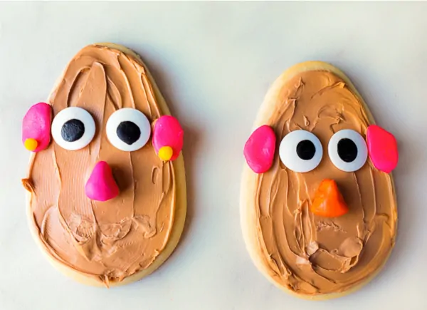 Mr. & Mrs. Potato Head Cookies | Make these DIY sugar cookies for your next Toy Story birthday party or just for fun! They're simple enough to have the kids help too! #themedbirthdays #birthdayparty #parties #partyfood #toystory #toystory4 #disney #partyideas #sugarcookies #cookies #desserts #kidsfood