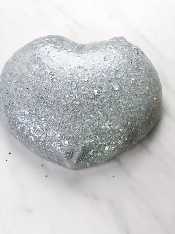 smooth blob of silver glitter slime