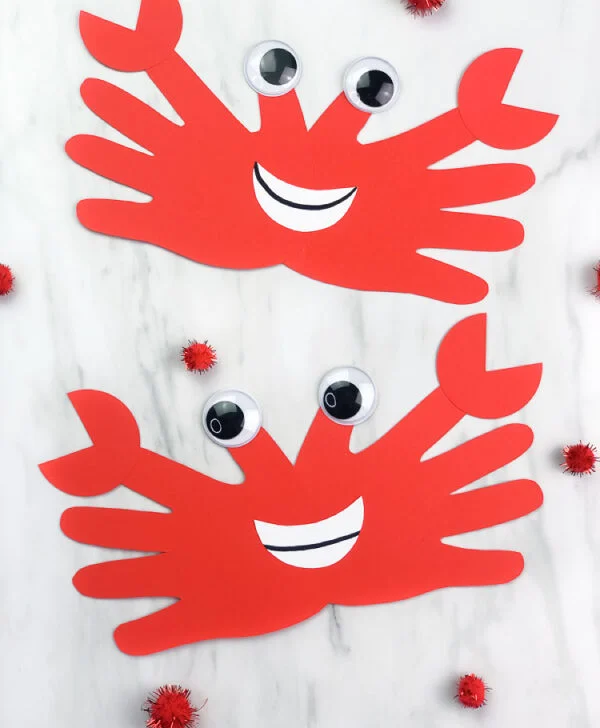 two side by side examples of finished handprint crab