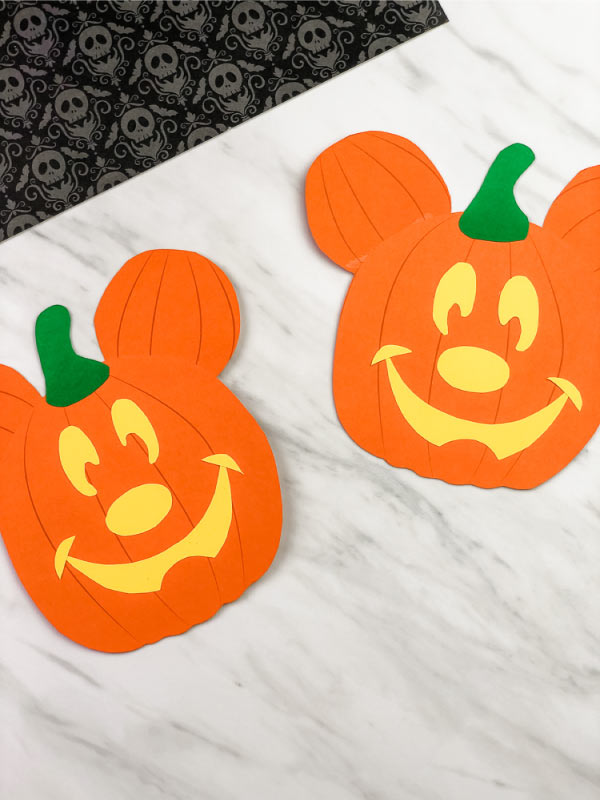 side by side examples of Mickey Mouse pumpkin