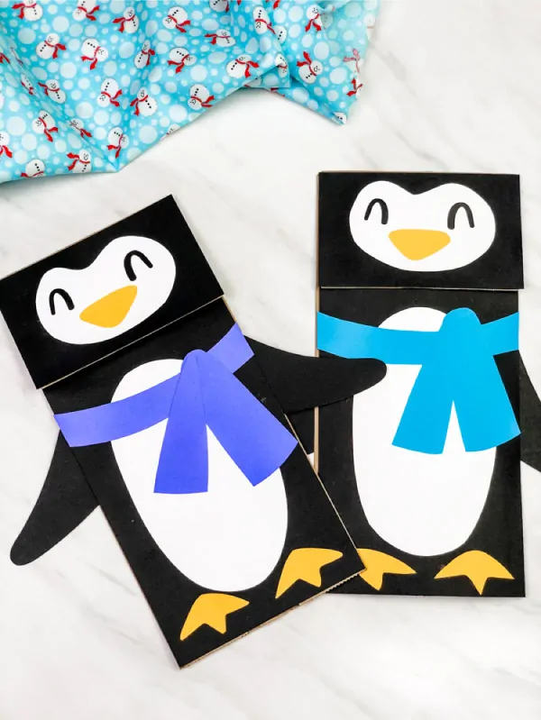 two paper bag penguin crafts