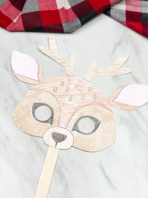 Colored in reindeer mask 