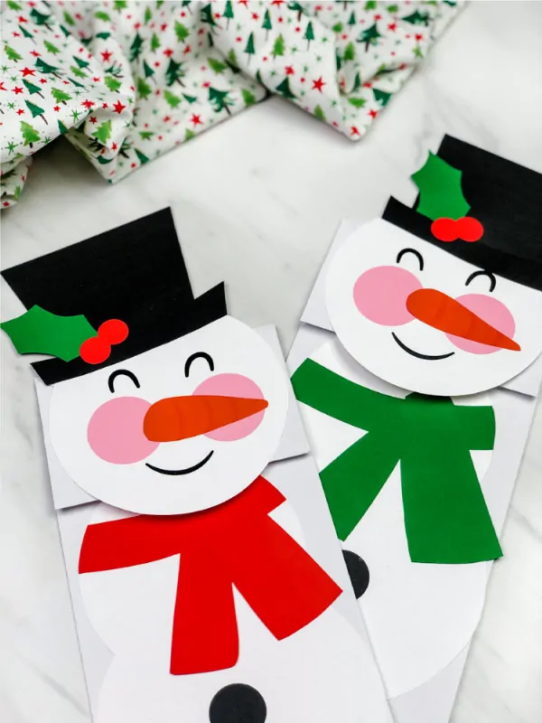 Two paper bag snowman crafts 