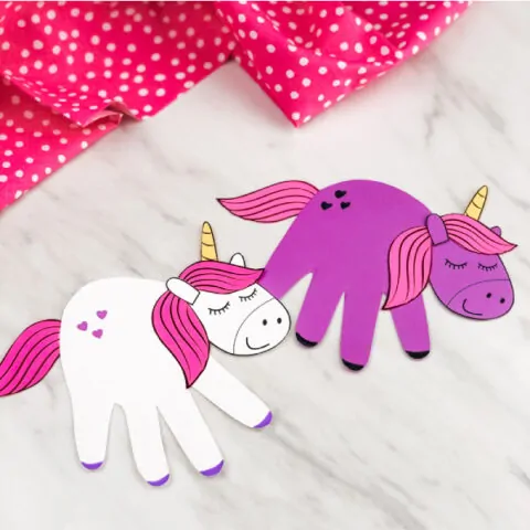 White and purple handprint unicorns 