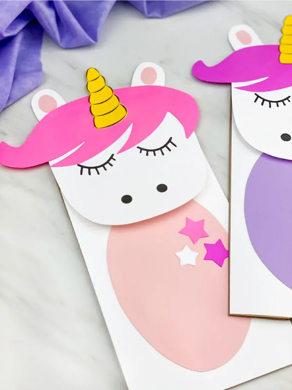 unicorn paper bag puppet with pink hair and light pink belly 