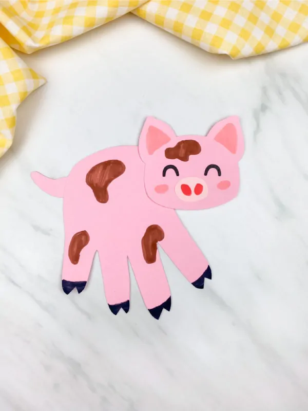 pink handprint pig with muddy spots
