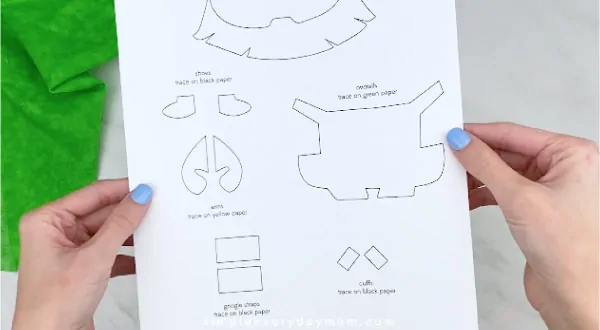 Hands holding leprechaun minion craft template 