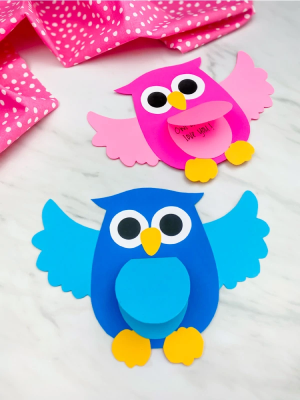 blue and pink owl card craft on marble background under title FATHER'S DAY CRAFTS FOR SENIORS