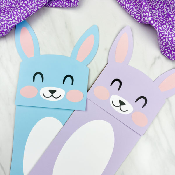 Closeup of a blue and purple paper bag bunny craft 