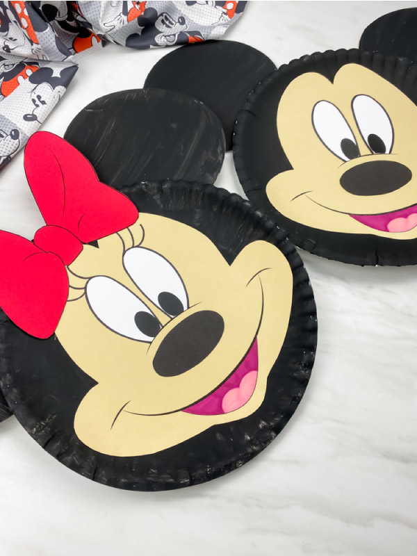 minnie mouse paper plate craft with mickey mouse in background