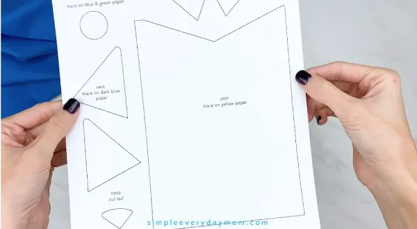 hands holding Pete the Cat craft template 