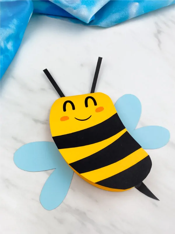 Closeup of paper bee card craft 