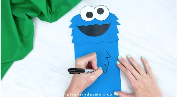 hand drawing on cookie monster hair 