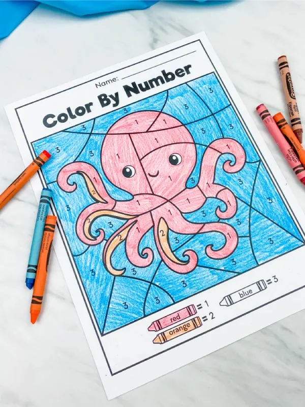octopus color by number with crayons scattered around it 