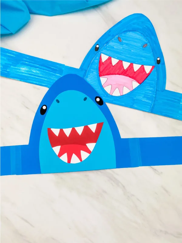 two shark headbands laying on marble background 