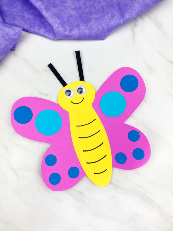 pink, blue and yellow paper butterfly craft