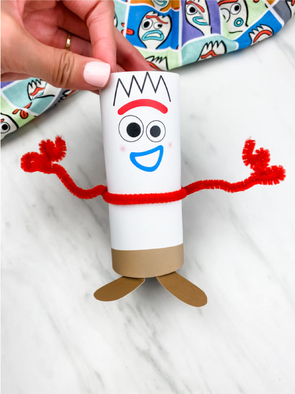 hand holding toilet roll forky craft