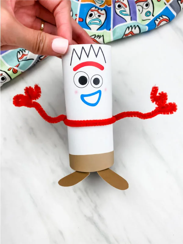 hand holding toilet roll forky craft